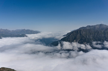 Fototapeta na wymiar Above the Clouds in the caucasus mountains