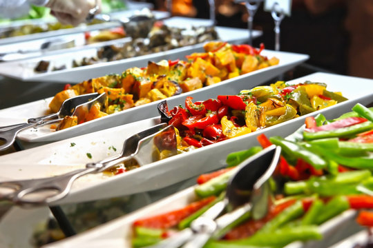 healthy food and salad bar selection of appetizer typically found at restaurant or hotel food buffets 