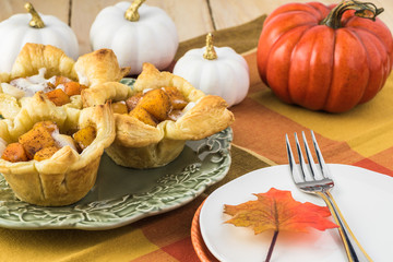 Puff pastry cup filled with pumpkin.