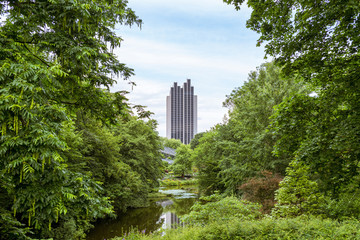 View over the urban green space  Planten un Blomen, with the high rise hotel close to the train station named Dammtor.