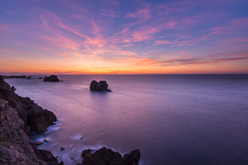 Sunset on the rocky beach