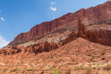 Capitol Reef National Park low angle landscape of colorful stone mountain side