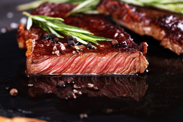 Barbecue Rib Eye Steak or rump steak - Dry Aged Wagyu Entrecote Steak on rustic background