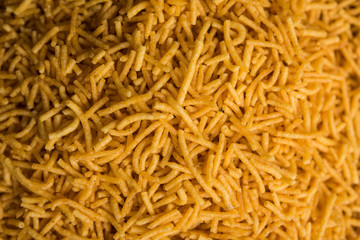 Aloo Bhujiya or Potato Bhujia also known as Namkeen sev. Popular Bikaneri recipe served in a bowl or plate. selective focus