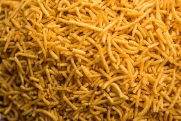 Aloo Bhujiya or Potato Bhujia also known as Namkeen sev. Popular Bikaneri recipe served in a bowl or plate. selective focus