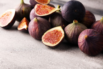 Fresh figs. Food Photo. whole and sliced figs on beautiful rustic background.