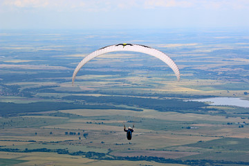 Paraglider flying from Brestovitsa in Bulgaria