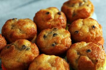 Chocolate muffin and nut muffin, homemade bakery on beautiful rustic background