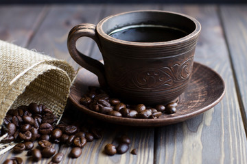 Cup of coffee and coffee beans