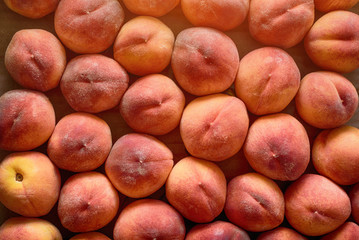 Fresh ripe peaches close-up. Wallpaper, background. Fruit season