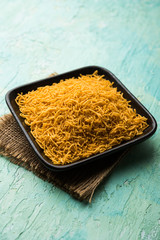 Aloo Bhujiya or Potato Bhujia also known as Namkeen sev. Popular Bikaneri recipe served in a bowl or plate. selective focus