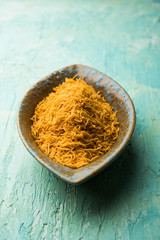 Aloo Bhujiya or Potato Bhujia also known as Namkeen sev. Popular Bikaneri recipe served in a bowl or plate. selective focus