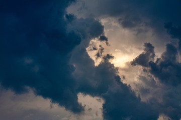 Light in the Dark and Dramatic Storm Clouds