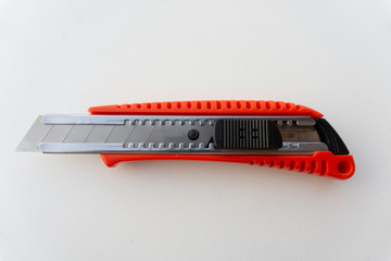 A red cutter isolated on white background.