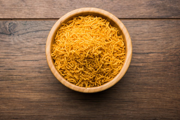 Aloo Bhujiya or Potato Bhujia also known as Namkeen sev. Popular Bikaneri recipe served in a bowl or plate. selective focus