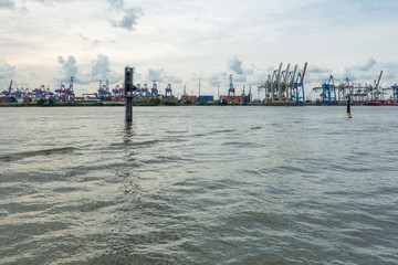 Fototapeta na wymiar a panoramic view of the port of Hamburg in cloudy weather