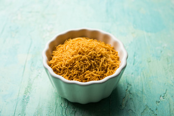 Aloo Bhujiya or Potato Bhujia also known as Namkeen sev. Popular Bikaneri recipe served in a bowl or plate. selective focus