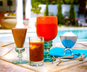 Drinks by the outside pool/garden