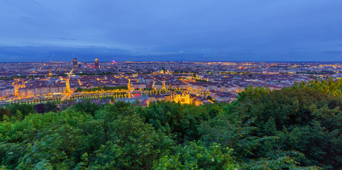 Saint-Jean cathedral, Saone  and city center, at evening, in Lyon