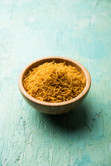 Aloo Bhujiya or Potato Bhujia also known as Namkeen sev. Popular Bikaneri recipe served in a bowl or plate. selective focus