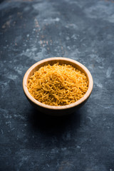 Aloo Bhujiya or Potato Bhujia also known as Namkeen sev. Popular Bikaneri recipe served in a bowl or plate. selective focus