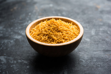 Aloo Bhujiya or Potato Bhujia also known as Namkeen sev. Popular Bikaneri recipe served in a bowl or plate. selective focus