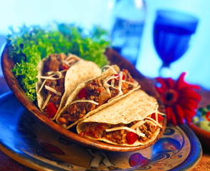 Mexican Spiced Mince in aTortilla with lettuce in bowl