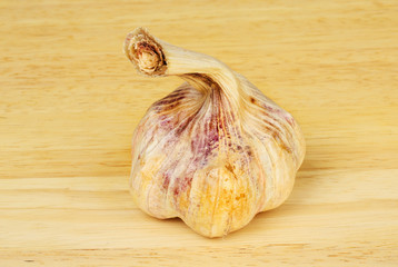 Garlic bulb on a chopping board