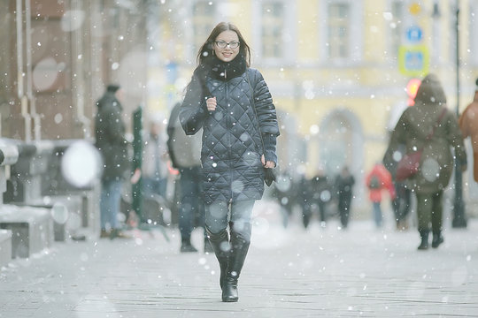 Girl In A Coat In The Winter City / Concept Of Fatigue Stress Christmas Chores