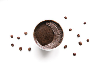 Scrub Top view photo Coffee beans and natural scrub in cosmetic jar on a white background Skincare product