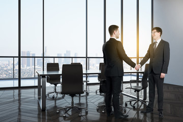 Businesspeople in modern meeting room