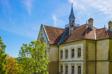 Fototapeta premium Sighisoara, Romania, May 13, 2019: A picturesque place near Sighisoara City Hall. From this place a beautiful view of the city opens. A popular place for tourists and a place for sunsets.