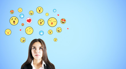 Portrait of attractive businesswoman with smileys