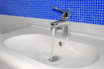 Water flows from the tap