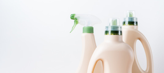Set of blank label bottles for mockup packaging of cleaning detergent on white background. Cleaning tools, cleanliness and cleaning layout.