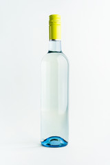 A bottle of white wine for the label layout on a light background. alcoholic beverage. branding