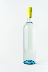 A bottle of white wine for the label layout on a light background. alcoholic beverage. branding