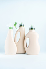 Set of blank label bottles for mockup packaging of cleaning detergent on blue white background....