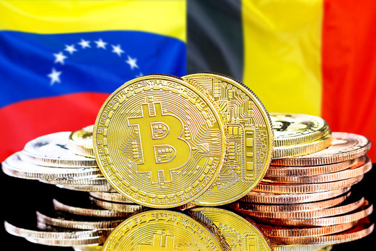 Bitcoins on Belgium and Venezuela flag background