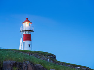 Fototapeta na wymiar lighthouse with twilight sky on Faroe islands Big size