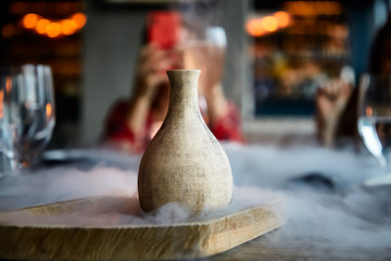 The cocktail is prepared in a clay pitcher