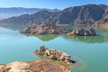 Dry desert badlands at the Lago Cuesta del Viento reservoir in San Juan, Argentina