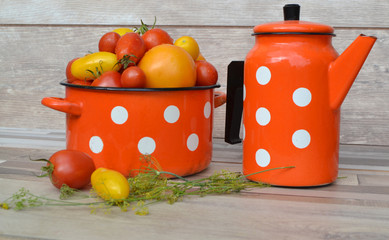 cherry red and yellow tomatoes, red, pan and teapot of russian style in red color with white dots pattern