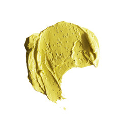 Sample smear of natural face scrub on white background