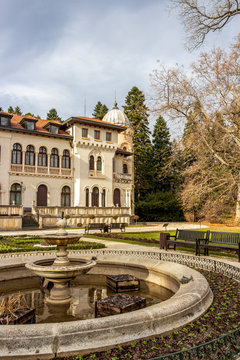 Frozen December fountain in front of Vrana Palace, a former royal palace in Sofia, Bulgaria, exterior detail