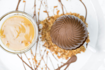 Melting chocolate sphere with caramel cream