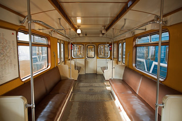 Interior of an empty retro car of a 1935 subway train. Moscow, Russia