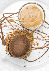 Melting chocolate sphere with caramel cream