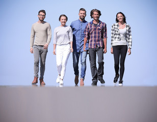 team of friends, walks on the road