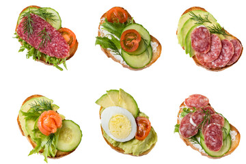 Set of six different sandwiches with sausage, cucumber, tomatoes, salmon, egg, avocado.